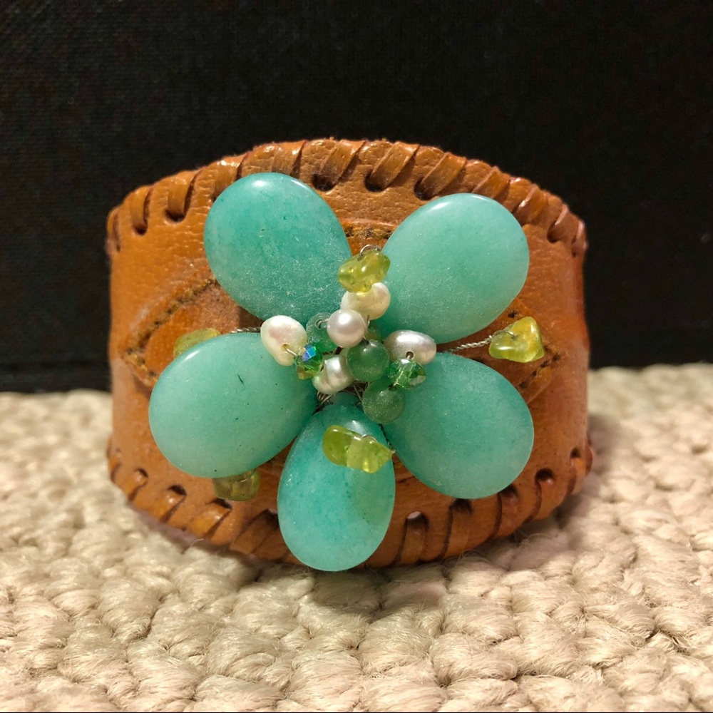 Jennifer Cuff with flower accent